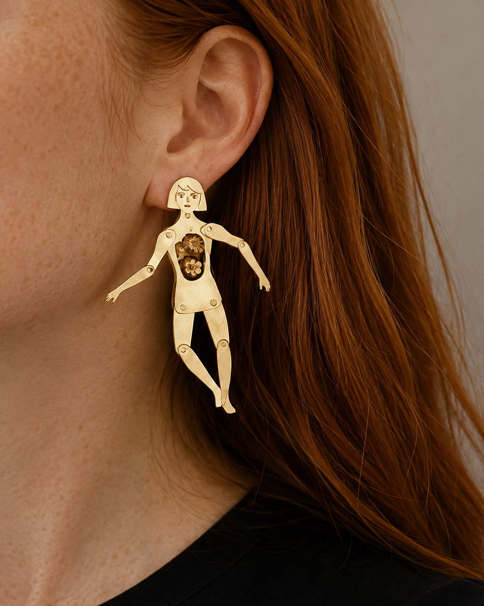 The articulated person earrings by Fake Plastic Love